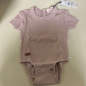 Brand new kids romper. Maybe pink.